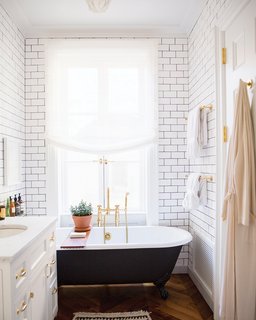 How to Prepare Your Bathroom for Overnight Guests - Photo 3 of 8 - Go the extra mile and provide a robe for your guests; Source: Roomed