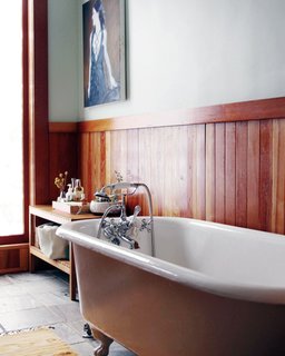 How to Prepare Your Bathroom for Overnight Guests - Photo 7 of 8 - Display an assortment of bath accoutrement near the tub for guests to indulge; Source: Jessie Webster