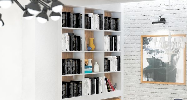 Previously existing walls were brought down, in order to create an open space, unifying a kitchen, a dining room and a living room. Merging aesthetic continues on to the bedroom, where two sinks and the wardrobe become the part of the room, as opposed to traditional approach of keeping them locked away from eye.
The apartment overlooks the city and the mountains, and for the outer visual richness to be fully embraced, the windows were enlarged to the wall scale.
Photo 7 of Double N Residence modern home