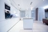 The house is spacious and the interior was designed in a manner, which kept this aspect highlighted: the entrance corridor leads to the large open area, uniting the kitchen, the living room and the dining room; The guest room wall, concealing the wardrobe, has two large incisions, making the wardrobe still part of the bedroom. Compelling design choice was also made for the master bedroom, where two sinks are not shying away from eye, but are rather put on display, as integral element of the bedroom.
Photo 17 of InnerEdges modern home