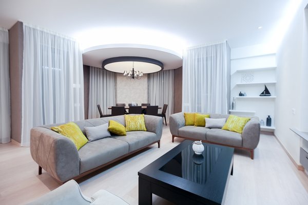 The house is spacious and the interior was designed in a manner, which kept this aspect highlighted: the entrance corridor leads to the large open area, uniting the kitchen, the living room and the dining room; The guest room wall, concealing the wardrobe, has two large incisions, making the wardrobe still part of the bedroom. Compelling design choice was also made for the master bedroom, where two sinks are not shying away from eye, but are rather put on display, as integral element of the bedroom.
Photo 6 of InnerEdges modern home