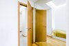 The low budget, family house project posed a challenge of conveniently arranging multiple rooms in small area. Pre-reconstruction edges of the walls were toned down, in order to conform to the new, minimalistic aesthetics and letting two colors prevail in the interior was also the part of the concept.
The white walls and the large mirrors make the space appear sizable. The wooden components of the interior bring a unifying ambience into play. The technical lighting illuminates the rooms without distracting the eye.
Photo 9 of PureLight modern home