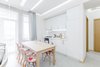 The low budget, family house project posed a challenge of conveniently arranging multiple rooms in small area. Pre-reconstruction edges of the walls were toned down, in order to conform to the new, minimalistic aesthetics and letting two colors prevail in the interior was also the part of the concept.
The white walls and the large mirrors make the space appear sizable. The wooden components of the interior bring a unifying ambience into play. The technical lighting illuminates the rooms without distracting the eye.
Photo 8 of PureLight modern home