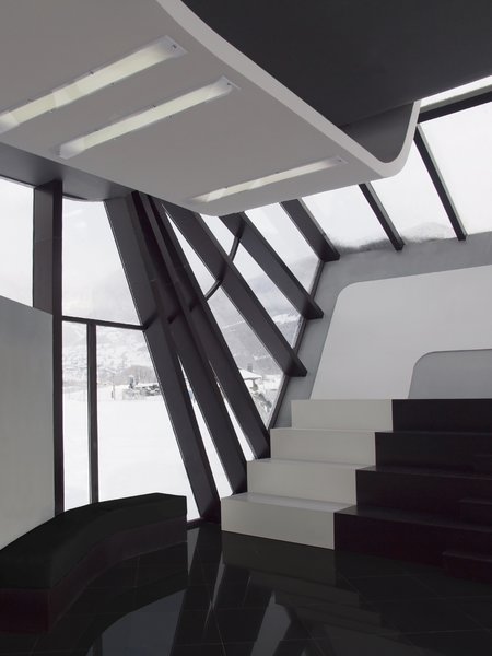 The influence of an ancient architectural forms from around the residence area is fully evident, although the structure of Mestia airport is intentionally minimalistic, in order to keep the focus on its functionality. The interior is also designed with an user friendliness in mind.
The building carries historic significance for the area, as it introduces contemporary architecture to it and creates a shortcut to the rest of the country.
Architect's note:
'This was the fastest paced construction process I have personally been involved in a. The possibility of a nonstandard project being accomplished in such a short period of time, materialized in front of me and gave me the boost to thrive for my own architectural visions to come to life'
Photo of Mestia Airport modern home