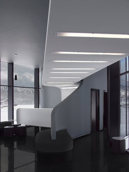 The influence of an ancient architectural forms from around the residence area is fully evident, although the structure of Mestia airport is intentionally minimalistic, in order to keep the focus on its functionality. The interior is also designed with an user friendliness in mind.
The building carries historic significance for the area, as it introduces contemporary architecture to it and creates a shortcut to the rest of the country.
Architect's note:
'This was the fastest paced construction process I have personally been involved in a. The possibility of a nonstandard project being accomplished in such a short period of time, materialized in front of me and gave me the boost to thrive for my own architectural visions to come to life'
Photo 3 of Mestia Airport modern home