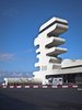 Sarpi border checkpoint is an architectural equivalent of a first impression. As a testament to this building being the entering point to Georgia, shape of the watchtower is inspired by the georgian lettering.
The customs hall for leaving Georgia is located closer to the seaside, than the one for entering the country and The duty free shop resides alongside to it.
The interior design is minimalistic in terms of both, forms and colors, amplifying the focus on functionality.
Architect's note: 'This project came with tight deadline and required meticulously thought-out planning of construction process, as it had to be put to use before the final completion of the building. Implementing interior design was particularly fulfilling experience for me.
My involvement in Sarpi border checkpoint and Mestia Airport projects served as a stepping stone for me, in terms of working independently as an architect and being more audacious in executing my personal architectural concepts that seemed way more challenging before.'
Photo 14 of Sarpi Border Checkpoint modern home