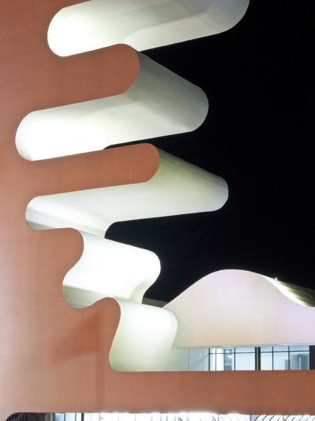 Sarpi border checkpoint is an architectural equivalent of a first impression. As a testament to this building being the entering point to Georgia, shape of the watchtower is inspired by the georgian lettering.
The customs hall for leaving Georgia is located closer to the seaside, than the one for entering the country and The duty free shop resides alongside to it.
The interior design is minimalistic in terms of both, forms and colors, amplifying the focus on functionality.
Architect's note: 'This project came with tight deadline and required meticulously thought-out planning of construction process, as it had to be put to use before the final completion of the building. Implementing interior design was particularly fulfilling experience for me.
My involvement in Sarpi border checkpoint and Mestia Airport projects served as a stepping stone for me, in terms of working independently as an architect and being more audacious in executing my personal architectural concepts that seemed way more challenging before.'
Photo 9 of Sarpi Border Checkpoint modern home