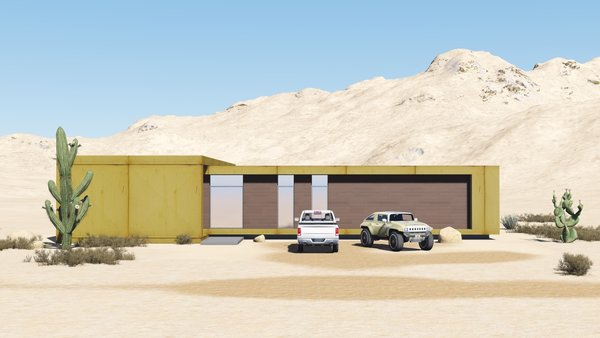 The desert loft resident is involved in off-road activities and required a place, which would sustain its appearance through sandstorms and extensive heat. The massive metal structure elegantly sits in the harsh environment.
The entrance door, secluded behind the thick metal screen, leads to the largest area of the house, unifying the kitchen, the dining room and the living room. The hall connects to three bedrooms and the bathroom.
The dining room exits to the terrace with the fireplace, carved in the floor. the ceiling is hollowed out right above it, following the lines of the round cut out in the floor. The gap's presence is almost poetic, as if it's the only passage transferring the smoke to the sky.
Photo 8 of Warmhole modern home
