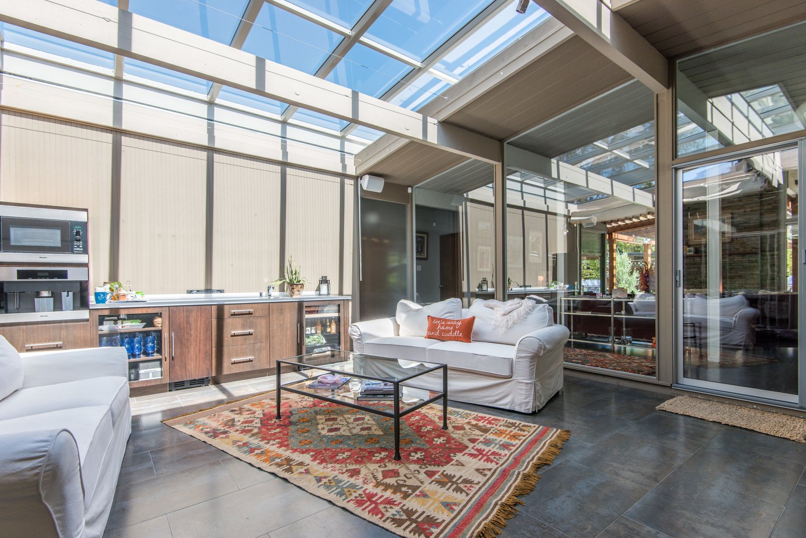 A sunlit atrium with the Rollamatic Roof