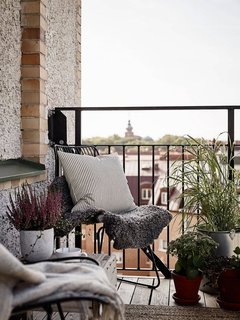 10 Ways to Use Rugs in Your Outdoor Space This Spring - Photo 8 of 10 - Small outdoor spaces carry big impact. Use patios and balconies to extend square footage in the city. 