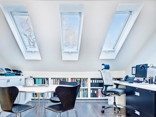 10 Ways to Create a Modern Workspace in Your Attic - Photo 7 of 10 - Lack of insulation and ventilation didn't prevent this Canadian attic from becoming a top-of-the line workspace for the townhouse's owners. 