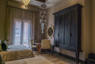Patrón Designed a Spanish Colonial Guest House with Modern Flair - Photo 11 of 14 - The beds and mattresses were custom sized to allow for what guests consider to be the right width and length to sleep in comfortably. 