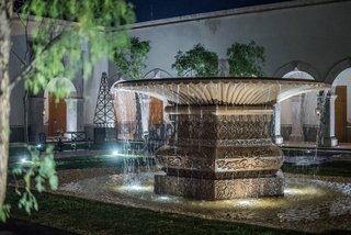 Patrón Designed a Spanish Colonial Guest House with Modern Flair - Photo 14 of 14 - The outdoor water feature does double duty; it also serves as a water replenishment well for plants and vegetation. 