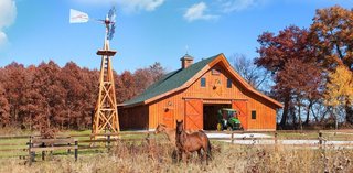 10 Prefab Barn Companies That Bring DIY to Home Building - Photo 8 of 10 - The Ponderosa Country Barn by Sand Creek Post & Beam features 12-foot closed lean-tos. All of their wood barn kits feature the strength and beauty of post-and-beam timber frame construction.