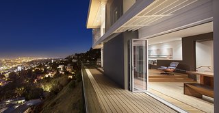 5 NanaWall Bifold Door Projects That Redefine Architectural Possibilities - Photo 4 of 5 - The pre-existing French doors and large windows were not maximizing on the stunning panoramic views at this Hollywood CA residence. During a renovation project, the space was transformed with jaw dropping results.