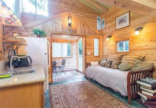 10 Dream Modern Home Rentals In Hawaii - Photo 6 of 10 - If you are traveling on a much more modest budget, look no further than this part fairy cottage, part hippie hideaway. This little house is tucked away in a lush Hawaiian garden. Perfect for unwinding.