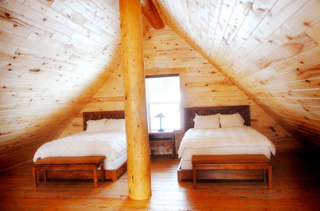 Alfie the A-Frame and 10 Other A-Grade Accommodations - Photo 6 of 11 - Enjoy a touch of luxury in these modern, cozy log cabins. Rustic at heart, each cabin houses either a one- or two-bedroom layout, a loft with two queen beds, fireplaces, stovetops, and spa-inspired bathrooms. Step outdoors and enjoy the surrounding Chalk Cliff views from your private deck or patio. All Cabins are a short walk to any of the natural hot spring pool areas and the Spa and Club at Mt. Princeton.