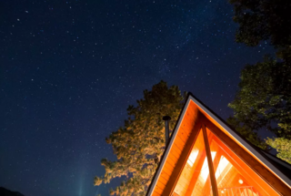 Alfie the A-Frame and 10 Other A-Grade Accommodations - Photo 8 of 11 - Perfectly located between Big Bear Lake and Lake Arrowhead, take in the gorgeous views from the big back deck. This charming and private A-frame cabin is the ideal escape.