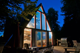 Alfie the A-Frame and 10 Other A-Grade Accommodations - Photo 10 of 11 - A cozy pet friendly A-frame nestled in the Jay Range with views of Whiteface Mountain, this home features a living room, fireplace, loft bedroom, and fully equipped kitchen. With endless activities to choose from, it's located just 10 minutes from Whiteface Mountain and 20 minutes from Lake Placid.