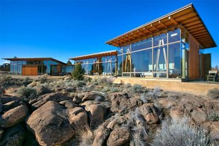 14 Really Romantic Island Resort Retreats - Photo 10 of 15 - On the market for $2,350,000, this ultra-contemporary beach house was designed by award-winning architects Nicolas Tye and local firm John Doak Architecture. With clean, modern lines and bold architectural angles, the home won the Governor’s Award 2015 for Design and Construction Excellence in the Cayman Islands. Ideal for indoor/outdoor entertaining, the 8,000-square-foot property features floor-to-ceiling glass walls and doors, glassed-in balconies off the bedrooms and three rooftop terraces with dramatic overhangs maximizing shade. Outside there is an L-shaped lap pool, garden and hammock adorned private beach. 