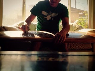 Crafting a Hollow Wood Surfboard from Old-Growth Redwood - Photo 22 of 26 - Waxing up in Long Beach.