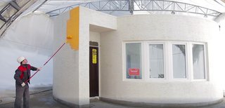 World's First 3D-Printed House Springs up in Russia in 24hrs - Photo 4 of 8 - German company BITEX provided unique finishing materials for the project: a mineral decorative plaster known as Reibeputz, and a high adhesion and vapor permeability and façade paint, Egalisationsfarbe, which is durable and resistant to adverse weather conditions. The paint is easy to apply and easily fills in roughness. After drying, it offers a solid matte surface without cracks, is eco-friendly, and resistant to weather conditions.