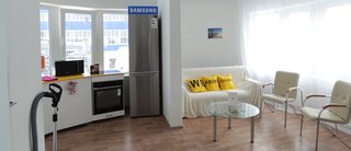 World's First 3D-Printed House Springs up in Russia in 24hrs - Photo 6 of 8 - Samsung provided high-tech appliances, including a TV set with the same radius of curvature as the curved walling of the house. 