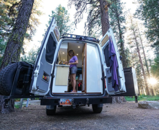 9 Adventure Seekers Who Celebrate Small Space Living Through the Van Life - Photo 6 of 10 - "Traveling in a van makes you do more with less. You don't have room for big kitchen appliances, gadgets, or even that much counter space. You toast bagels on the stove, brew one cup of coffee at a time, and are forced to get creative with ingredients. Everything takes longer, but that's OK, because those meals sure taste good out here," says Kristen of Bearfoot Theory about her life on the road in her solar-powered Sprinter.