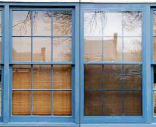 Storm windows, while never invisible, can have a reduced appearance if painted to match the existing window frames and if designed to fit flush, rather than protruding out from the facade.