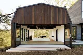 Guide to 7 Main Types of Roofs and What You Need to Know About Them - Photo 5 of 15 - To make the common gambrel roof more contemporary, architecture firm Walker Workshop played with the typical proportions of a gambrel roof to make it wider. 