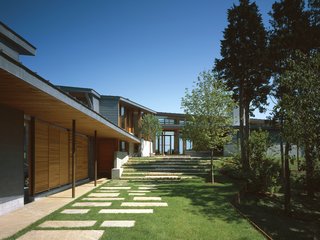 12 Modern Marvels in New England - Photo 8 of 12 - Orleans House occupies one of the easternmost points in the U.S., a place exposed to salt water, light, sky, marsh, bay, barrier beach, and open ocean. Tides, wind, and waves are forever remaking the landscape; here is a world in motion. We let these elements guide us as we began designing.