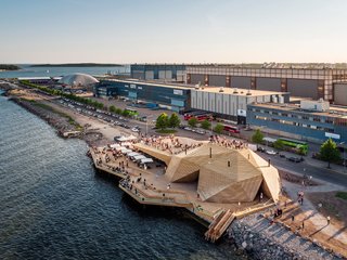 Escape to One of These 10 Otherworldly Outdoor Saunas - Photo 5 of 10 - This waterfront sauna by Avanto Architects features a louvered skin system, exposed steel, and planks that cast linear shadows onto the sauna's structure.