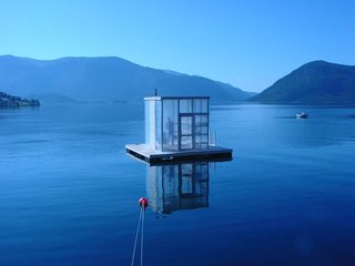 Escape to One of These 10 Otherworldly Outdoor Saunas - Photo 2 of 10 - Designed by Marco Casagrande, this floating sauna was a gift for the Rosendal community, a village at the end of the majestic Hardangerfjord in Norway.