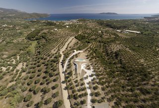 This Y-Shaped Greek Villa Looks Like a Flying Saucer That’s Embedded Into the Hills - Photo 3 of 8 -