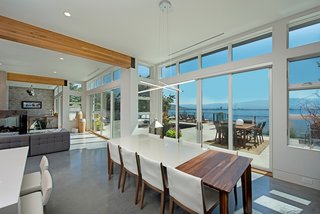 Picturesque Lake Views Connect a Young Family to the Outdoors in British Columbia - Photo 2 of 2 - Expansive windows allow Shannon and Cory to entertain their family and friends year round—inside and out! 