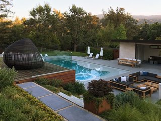 Take a Plunge Into These Enticing Modern Pools - Photo 8 of 12 - Terraced decks to pool and pool house.