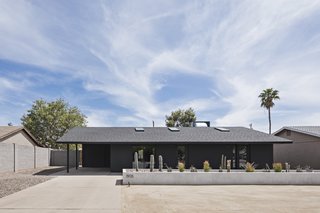 Bold Design Moves Invigorate a Formerly Cookie-Cutter Midcentury Offered at $345K - Photo 1 of 10 -