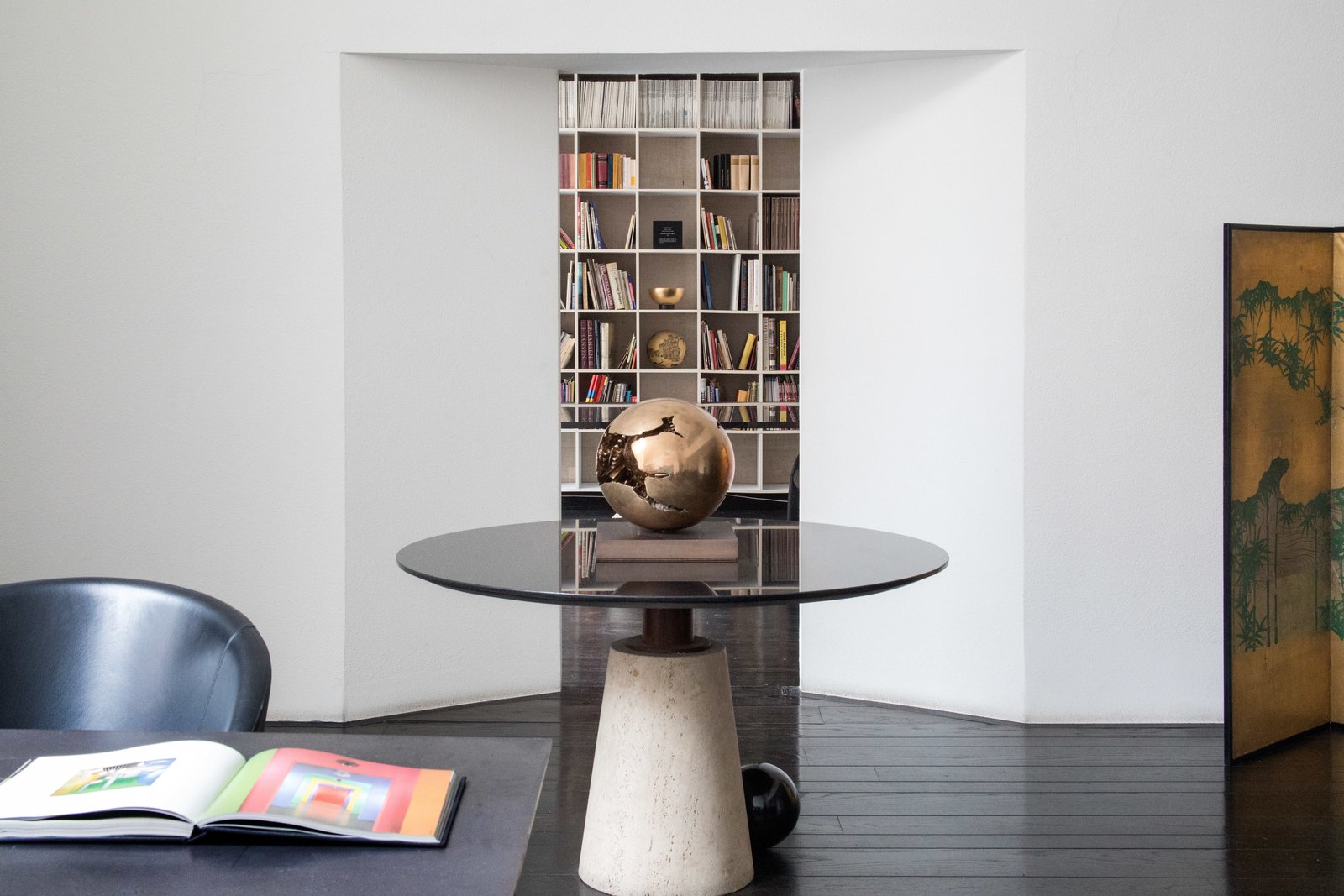 Their offices were side-by-side. His in the living room and hers adjacent, making for easy collaboration.