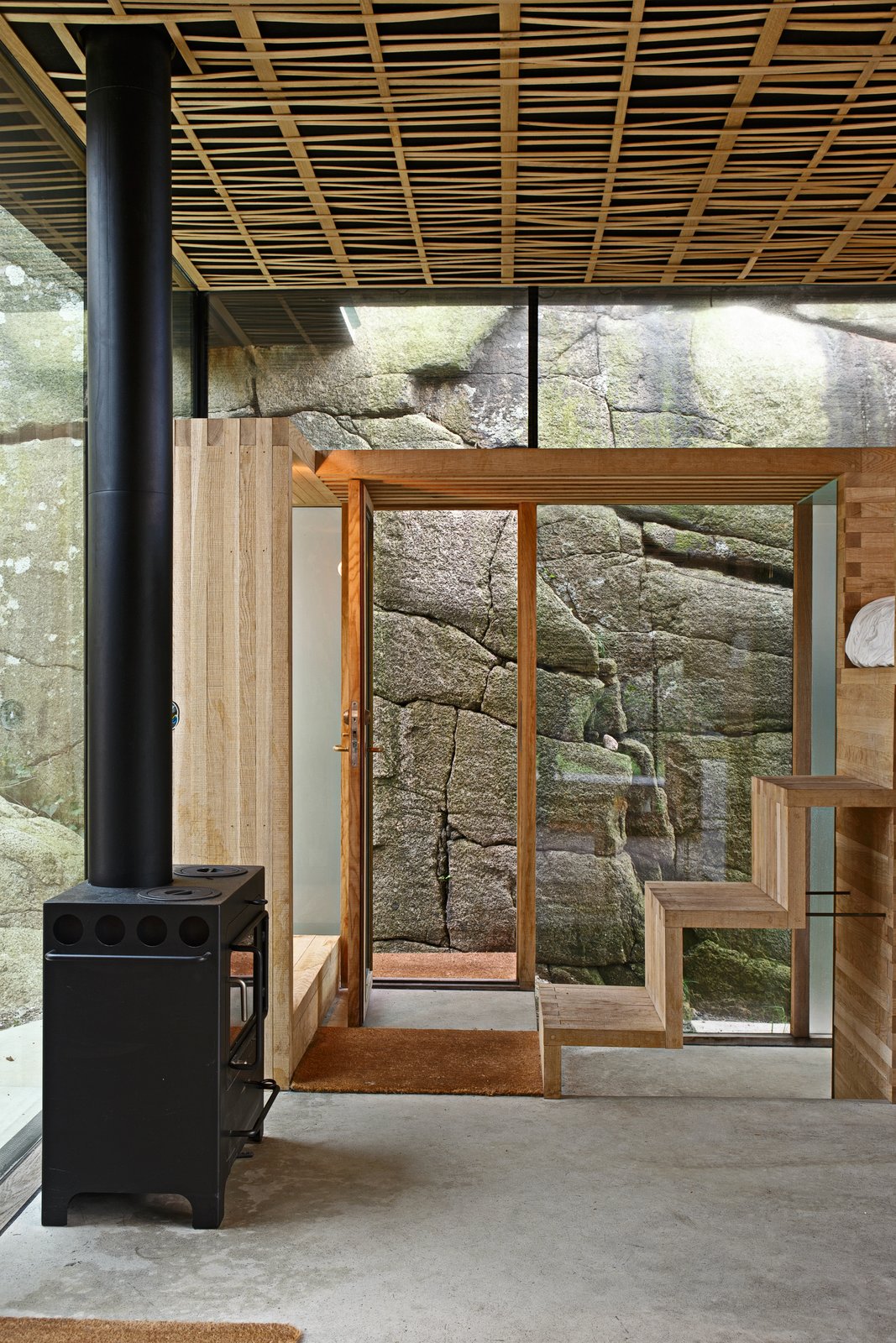 Oak steps lead to the loft bed.