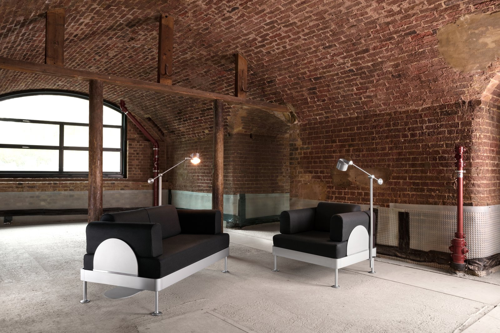 This shows how the basic platform of the DELAKTIG can be elevated into a couch and side chair with accent lighting, thanks to its add-on components.
