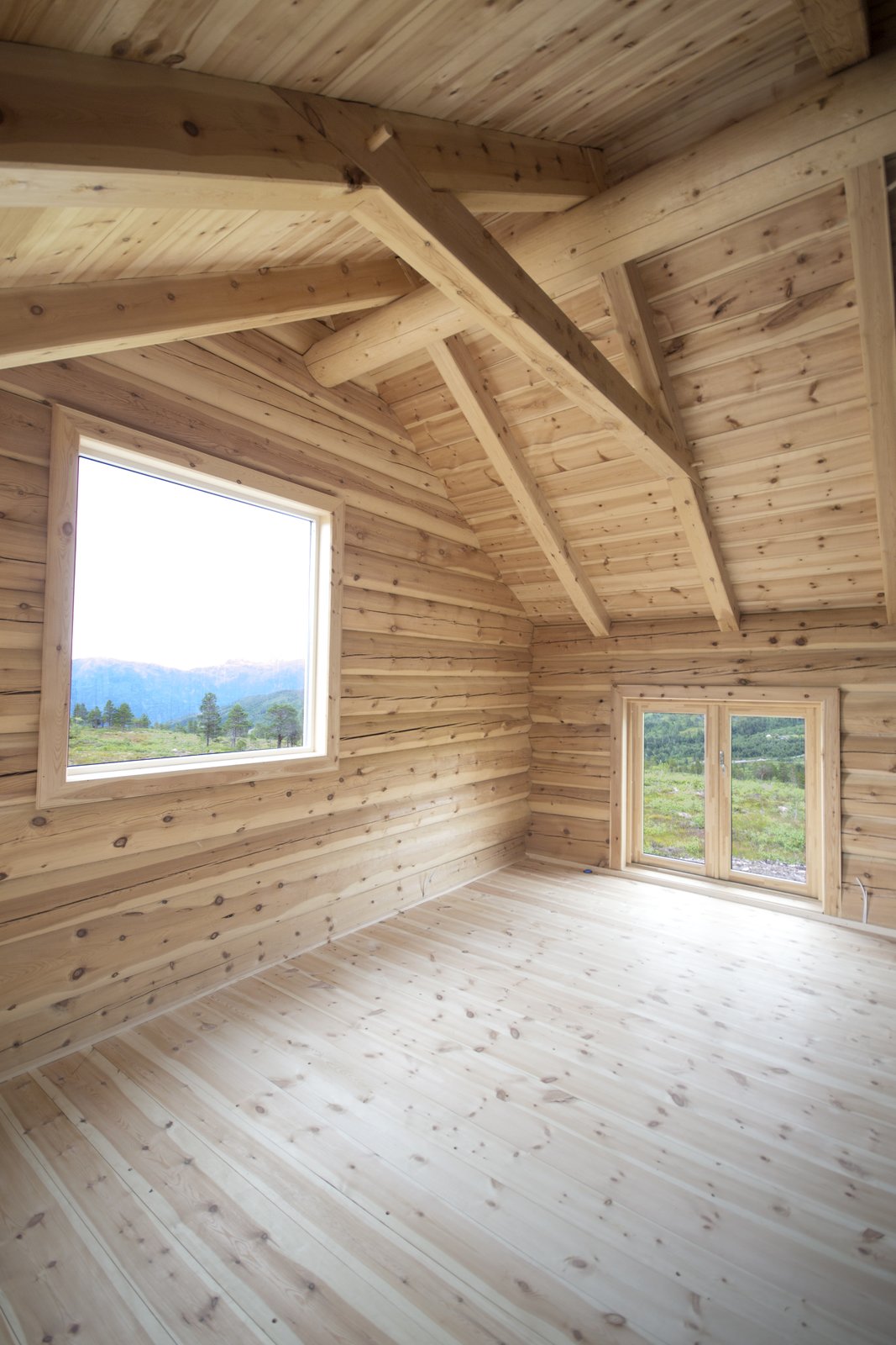 In the fourth section of the cabin, there's a large North-facing window for observing northern lights.
