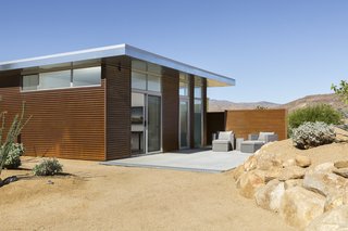 The casita houses a king-size bed, a bathroom, and an outdoor shower.