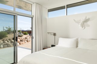 The casita sleeping area opens up to the landscape.