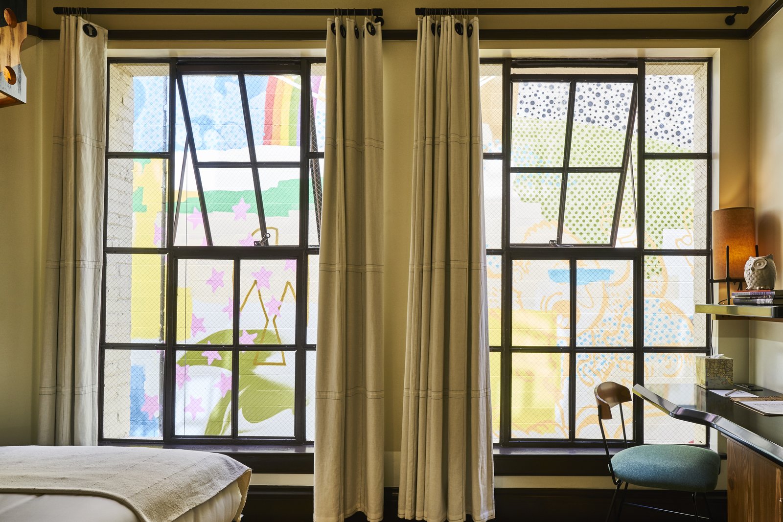 a 1920s office building is revamped as a craftsman-inspired hotel a 1920s office building is revamped as a craftsman-inspired hotel