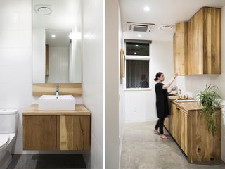 A Modern Micro-House in Portland Clad in Local Fir - Photo 4 of 8 - White oak cabinetry was custom built and fabricated by FWD. Polished concrete floors and white tile complement the warm wood tones. 