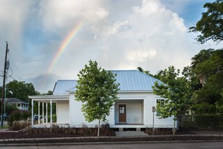 A Victorian Cottage in Houston Finds New Life as a Local Firm's Office - Photo 6 of 13 - The renovated west facade of the home displays both the front and unique side porch.