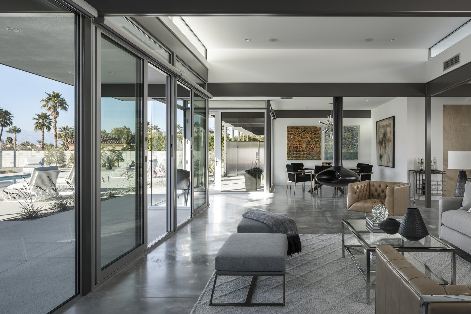 Full height glazing and continuous material use allow spaces to flow freely from one another, and from inside to outside.