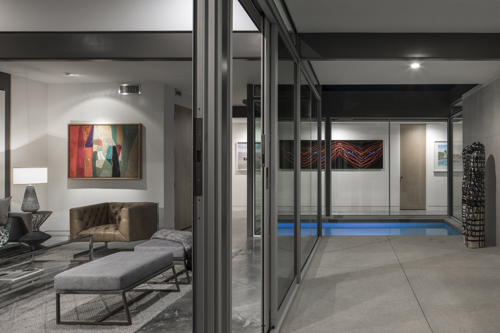 Further emphasizing the indoor-outdoor connection is a water feature which extends between spaces.
