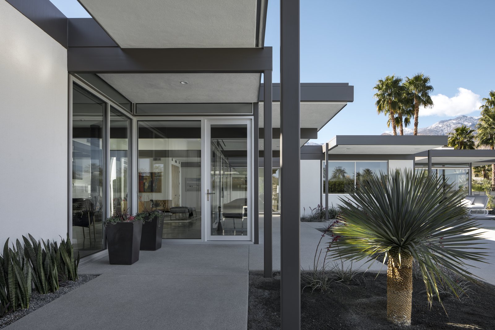 The steel post and beam structural components frame entry ways and circulation.