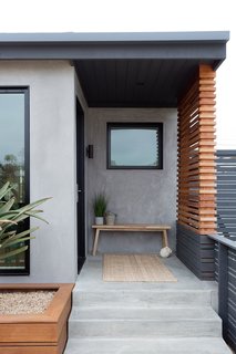 Merging Inside and Out, an L.A. Firm Modernizes a 1940s Abode - Photo 5 of 18 - Front Entry Door & Privacy Screen